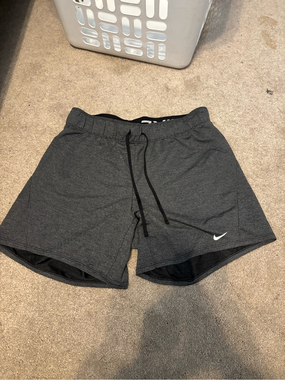 Woman’s grey Nike shorts